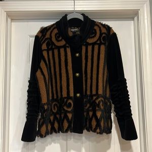 Women’s black and brown fleece jacket.